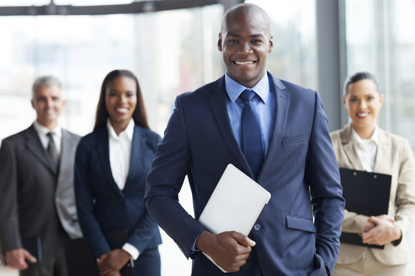 Business and finance professionals in an office foyer